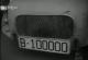 B-100000